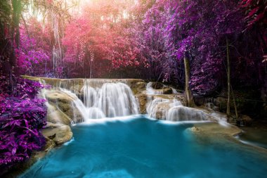 Huay Mae Kamin Waterfall, beautiful waterfall in rainforest at K clipart