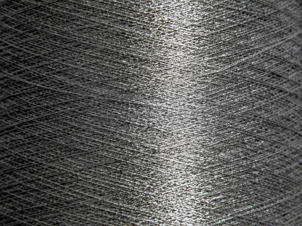 銀縫製糸またはワイヤーのマクロショット — ストック写真