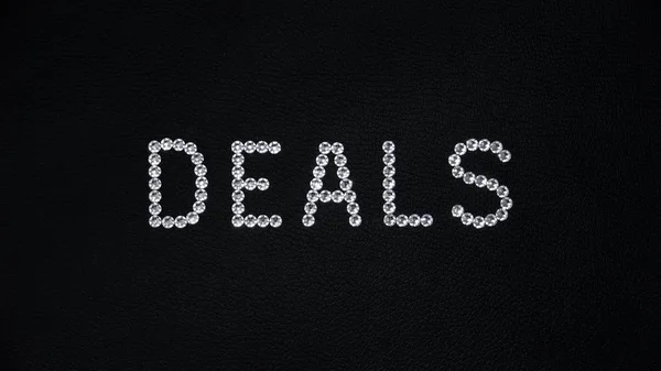 Word Deals Feitos Cristais Swarovski Brancos Brilhantes Colocados Couro Preto — Fotografia de Stock