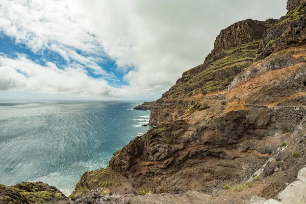 View from Punta de Avalo. In the background: lighthouse San Cristobal on Punta del Faro, located on a high rocky cliff in the vicinity of the capital of the island of La Gomera, Canary Islands — Stock Photo, Image