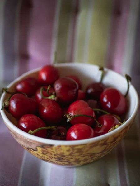 Red cherries in a bowl — Stock Photo, Image