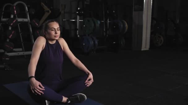 Young Beautiful Girl Athletic Shape Loosens Shoulders You Exercise Sitting — Stockvideo