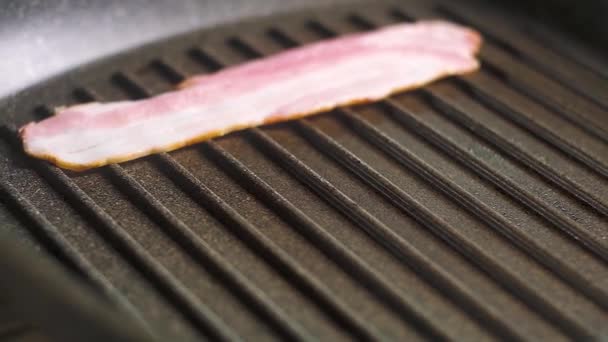 Cook Puts Three Juicy Sliced Thin Slices Pork Bacon Grey — Stock Video