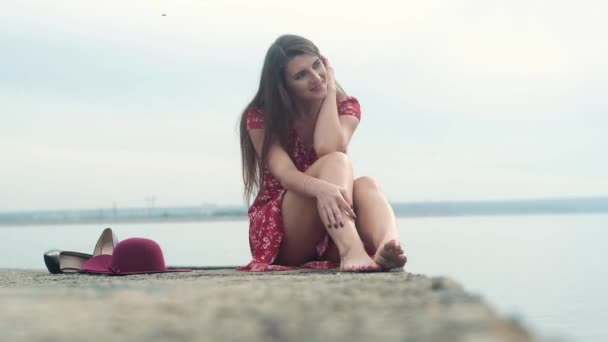 Beautiful Girl Red Short Dress Long Dark Hair Sits Alone — Stok video