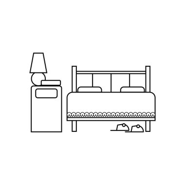 Yatak ve komodinli lamba. Otel tabelası 10.