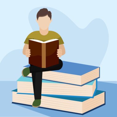 Genç adam kitap okuyor.