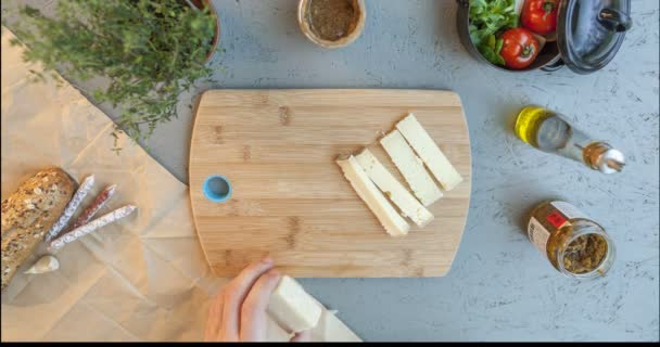 Top View Man Making Appetizer Plate Cheese Meat Wooden Board — Stock Video