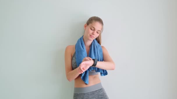 Young Fit Woman Checking Her Smartwatch Gym — Stock Video