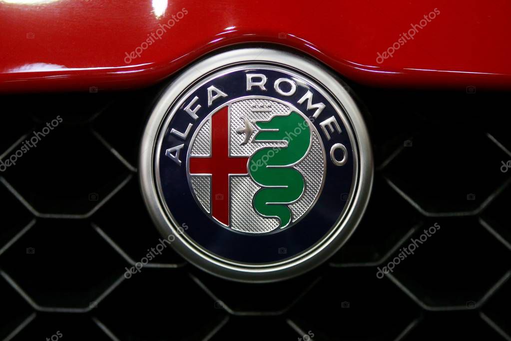 Bucharest, Romania - October 21, 2018: The logo of a red Alfa Romeo car is seen during Bucharest Auto Show, in Bucharest, Romania. This image is for editorial use only.
