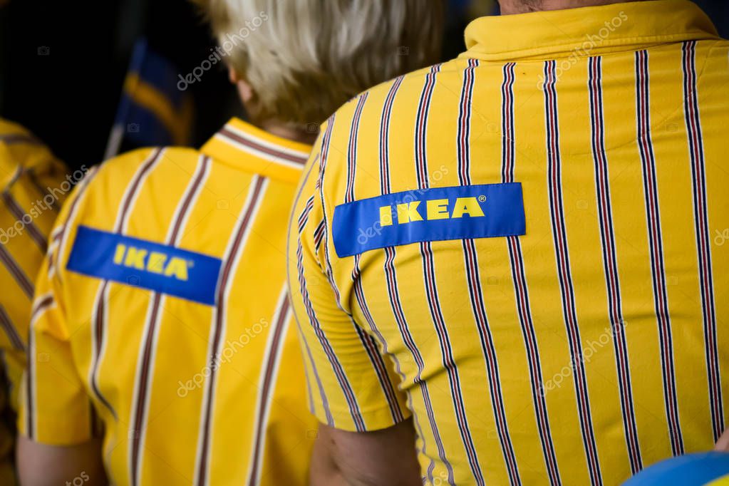 Bucharest, Romania - June 24, 2019: IKEA staff dressed in uniforms are waiting the first buyers in the opening day of the IKEA Pallady store, which is the second in Bucharest and elsewhere in Romania.