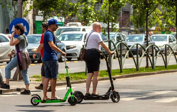 City life - electric scooter -  Bucharest, Romania — Stock Photo, Image