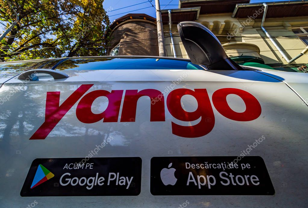 Bucharest, Romania - September 09, 2019: A car with the Yango logo of the multinational Yandex.Taxi BV belonging to Russian multinational corporation Yandex N.V. is parked on a street in Bucharest.