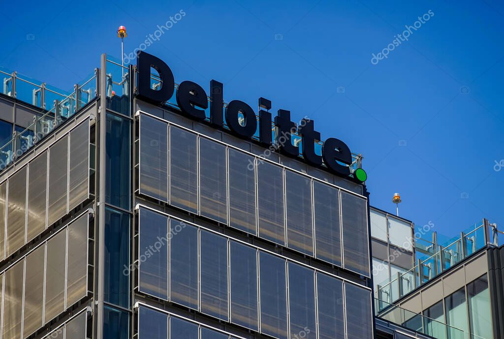 Bucharest, Romania - May 12, 2020: The logo of British audit & assurance, consulting, financial advisory, risk advisory, tax and related services Deloitte is seen on top of a building, in Bucharest.