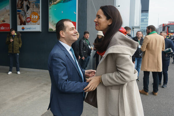 Bucharest, Romania - 2nd Mar, 2024: Clotilde Armand, the mayor of sector 1, is welcomed by Ludovic Orban (L), president of Force of the Right (FD) party, at the election conference of the party.