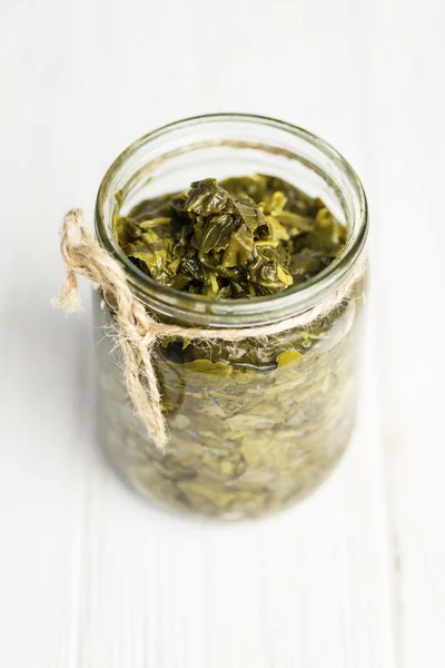 Canned Fresh Sorrel Glass Jar Wooden Background — Stockfoto