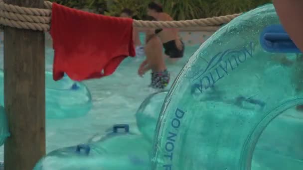 Close Scene Waterpark Visitors Walking Swimming Pool Inflatable Tube — Stock Video