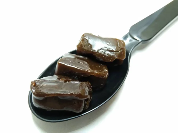 Picture Coffee Flavour Candy Black Spoon — Stock Photo, Image