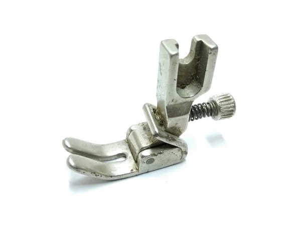 Beyaz bir arka plan üzerinde izole dikiş makinesi parçası bir resim