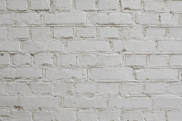 Closeup of old white brick wall texture