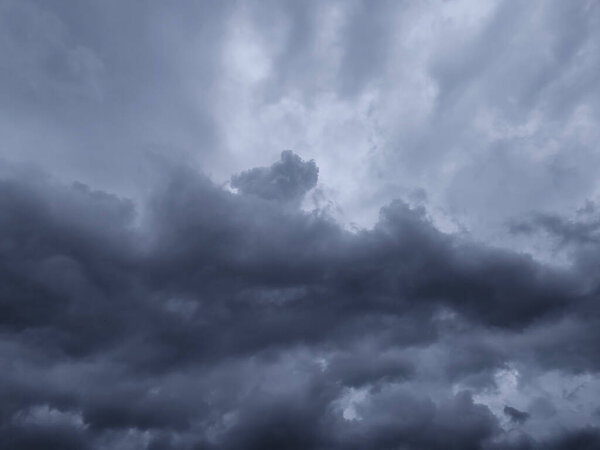 Dark sky composed of purple, blue, pink  for graphic design or wallpaper. Misty storm background in supernatural mystery concept. 