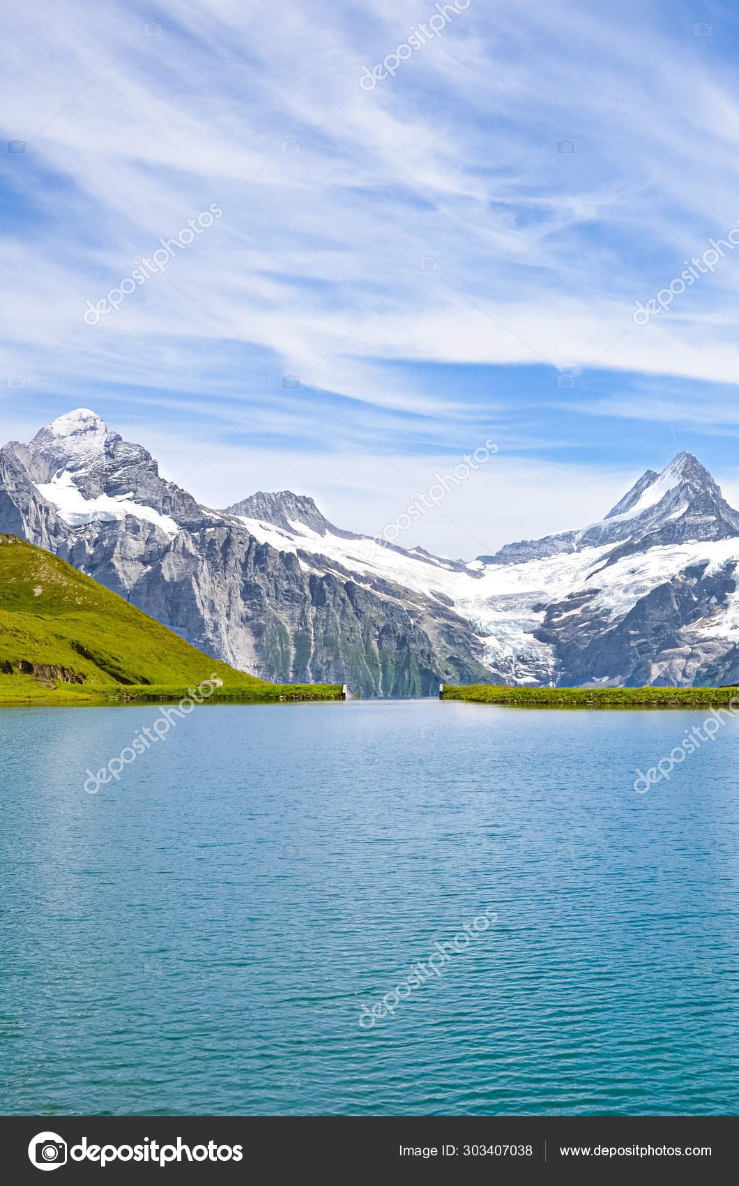 Vertical Picture Of Amazing Bachalpsee Near Grindelwald In Swiss Alps Photographed With Famous Mountain Peaks Eiger Jungfrau And Monch Alpine Lake Landscape Switzerland Snow Capped Mountains Stock Photo C Ppohudka 303407038