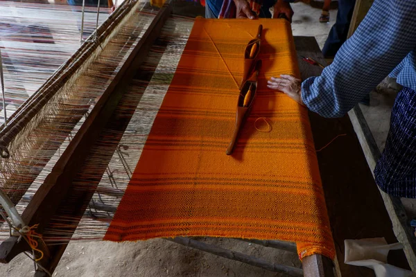 Thai traditional weaving with loom