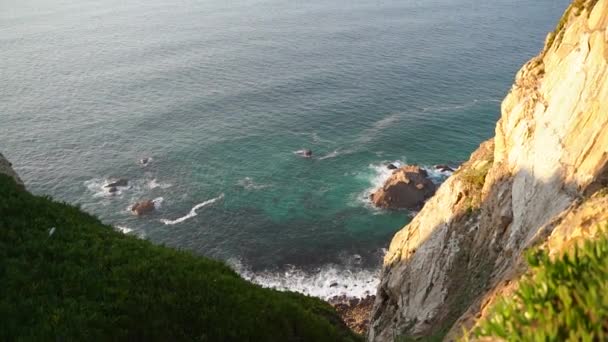 Downward top down perspective over a huge treacherous dangerous cliff at Cape Roca — Stock Video