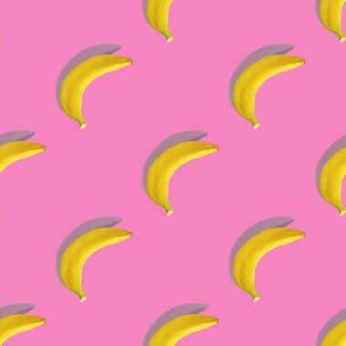 Pembe arka planda gölgesi olan muz. Kusursuz desen. Renk, diyet. Muzlu tropikal desen.