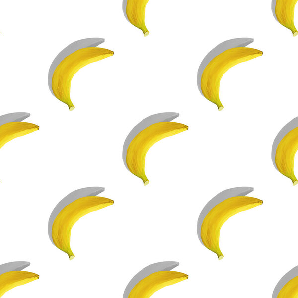 Banana with shadow isolated on a white background. Seamless pattern. Color, diet. Tropical pattern with bananas.