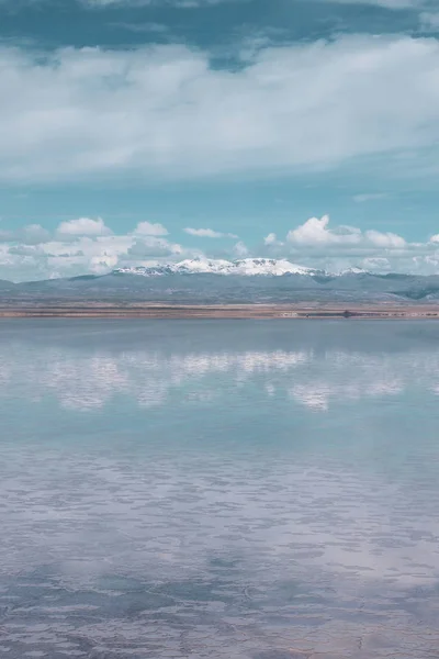 Endless landscapes with reflection like mirror of sky in Salar de Uyuni, Bolivia