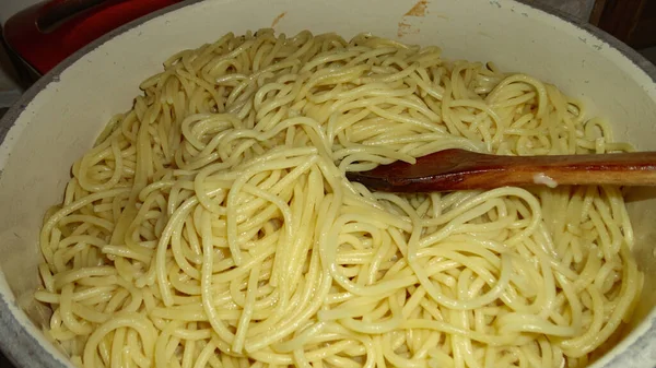 Large Bowl Freshly Cooked Pasta Wooden Spoon Closeup — Stock Photo, Image