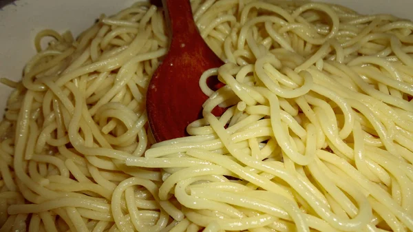 Large Bowl Freshly Cooked Pasta Wooden Spoon Closeup — Stock Photo, Image