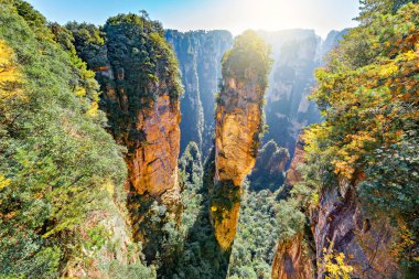 Natural quartz sandstone pillar the Avatar Hallelujah Mountain is 1,080-metre (3,540 ft) located in the Zhangjiajie National Forest Park, in the Wulingyuan Area, in northwestern Hunan Province, China. clipart
