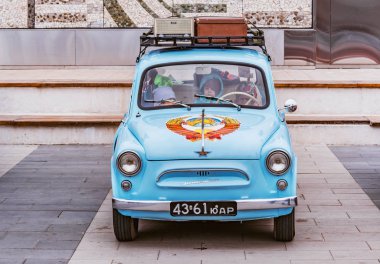 Korolev, Russia - April 14, 2019: Parade of the retro Soviet cars on the central city square.