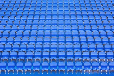 Yeni stadyumun tribününde mavi boş koltuklar.