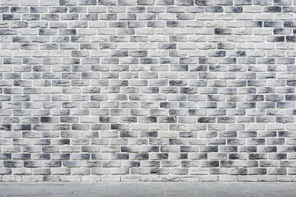 Grigio sfondo muro di mattoni fuori og l'edificio . — Foto Stock