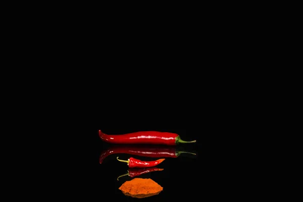 Of red hot pepperblack background — Stock Photo, Image