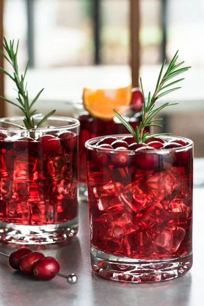 Cranberry Vodka Spritzer with Rosemary Garnish — Stock Photo, Image