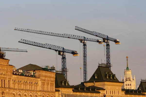 Real estate, new building, construction cranes, Industrial landscape of the building.