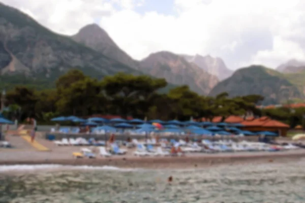 Defocused photography. Rest at the sea, resort on the Mediterranean coast of Turkey, in the province of Antalya, Kemer. Blurred background copy space for your design