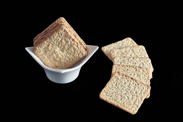 wholemeal cookies grouped on blue background