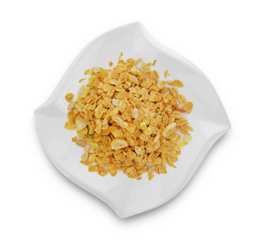 plaka beyaz zemin üzerine müsli