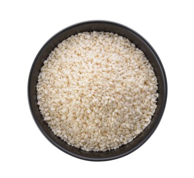 Beyaz zemin üzerinde bir kasede Beyaz Susam