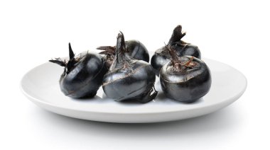 Beyaz bir arka plan üzerinde izole Waterchestnuts plaka