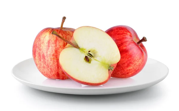 แอปเป แดงในจานท แยกก นบนพ นหล ขาว — ภาพถ่ายสต็อก