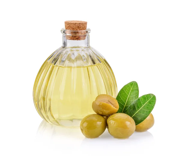 green olives and oil on a white background