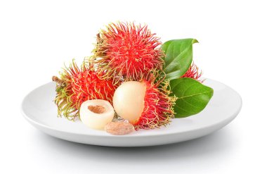 Rambutan beyaz bir arka plan üzerinde izole plaka
