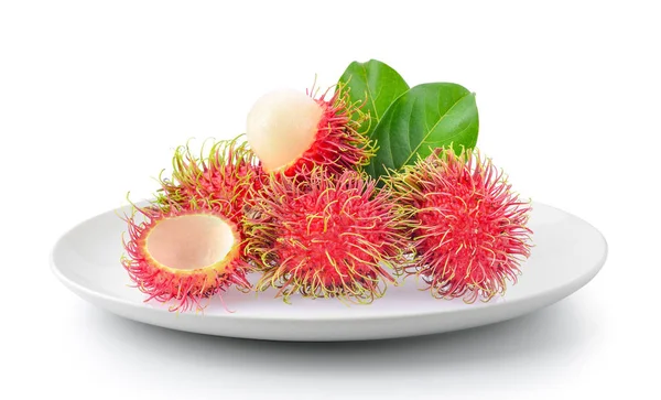 Rambutan beyaz bir arka plan üzerinde izole plaka