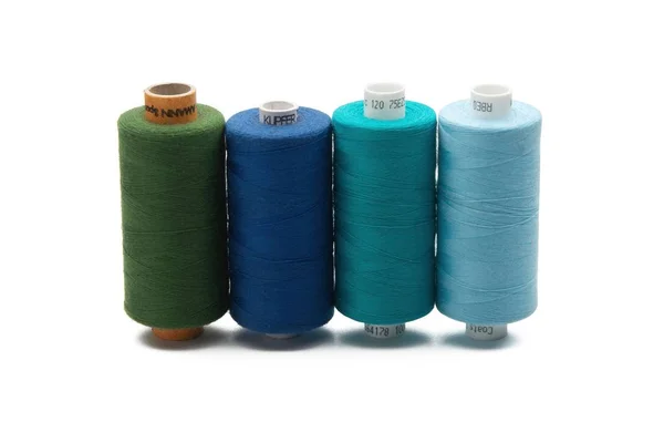 Rainbow colored sewing thread lined — Stock Photo, Image