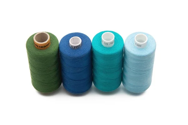 Rainbow colored sewing thread lined — Stock Photo, Image